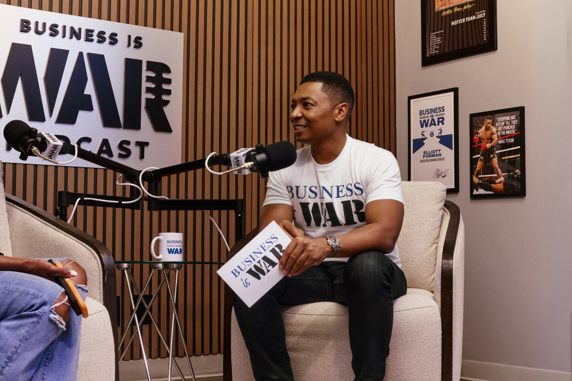 Elliott Forman recording the Business Is War podcast
